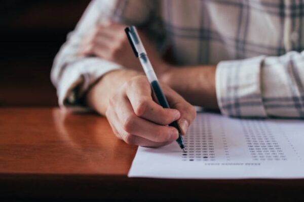 Class 11 Economics Past Paper 2022 BISE Faisalabad